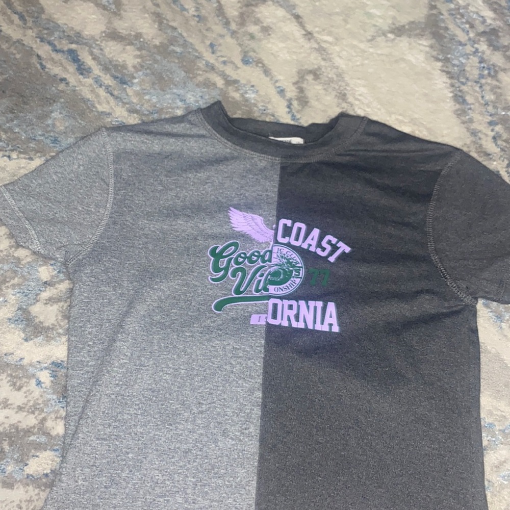 Two sided baby tee with small hole